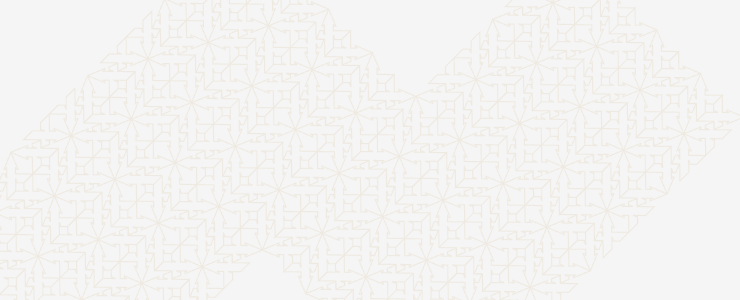 A white backdrop adorned with a geometric pattern of squares arranged in a grid.