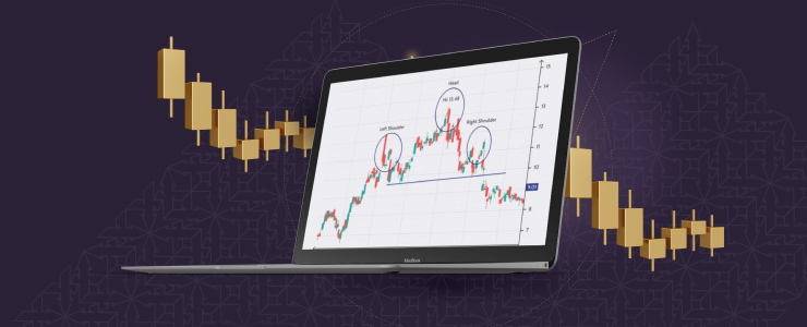 A laptop featuring a chart related to trading chart patterns next to a gold bar, illustrating financial analysis and investment.