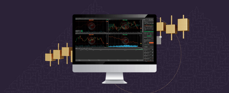 A computer monitor with a gold backdrop and a gold bar, illustrating the concept of trading platforms in finance.